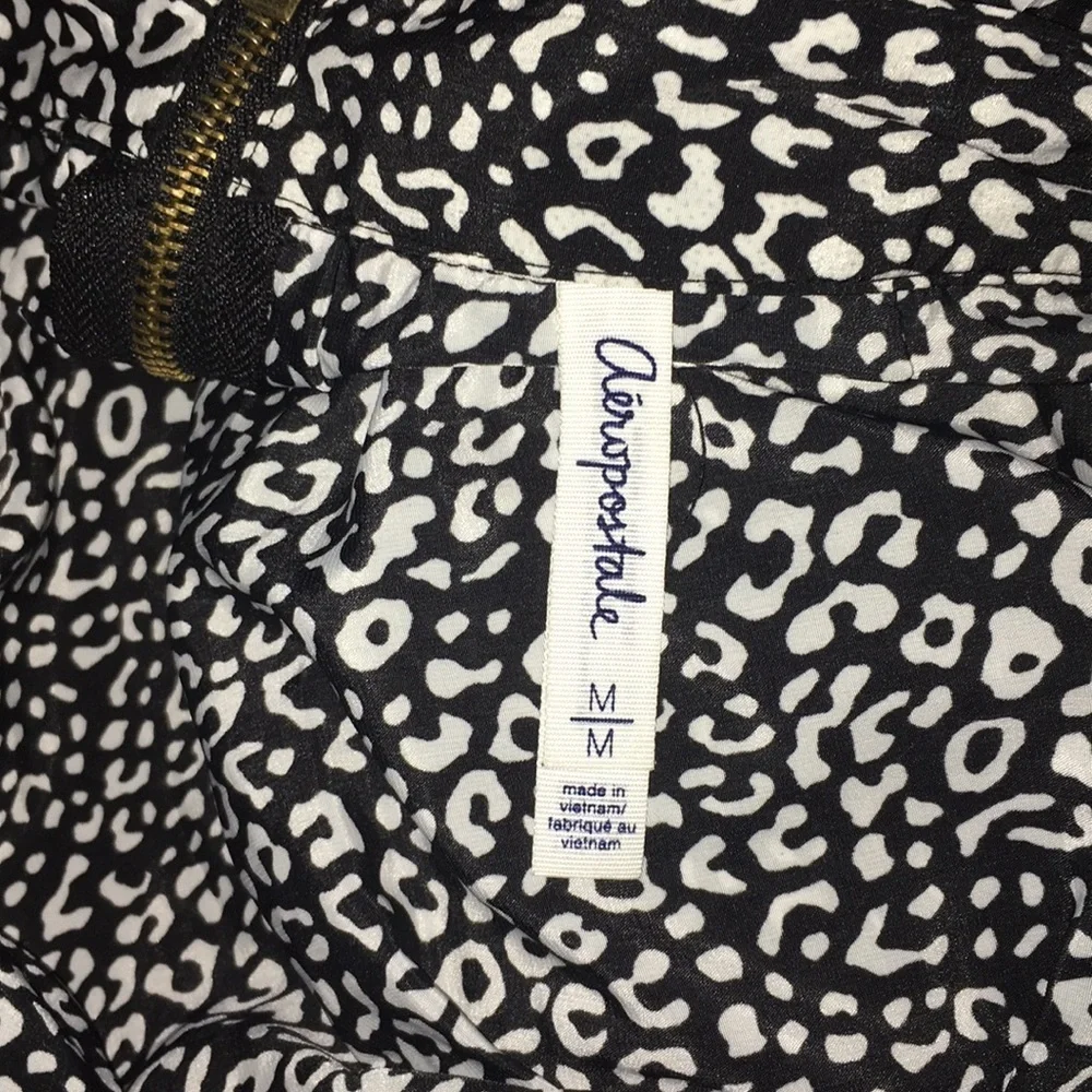 Above the knee black and white skirt